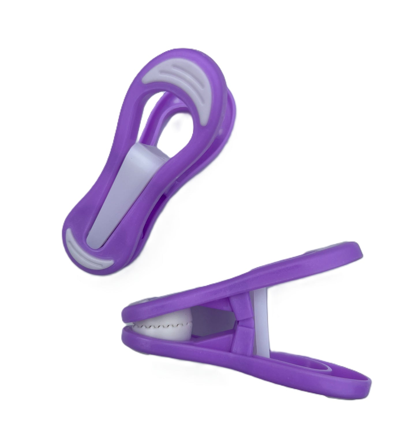 Purple and white clothes pegs